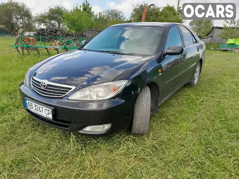 Седан Toyota Camry 2004 2.4 л. Автомат обл. Житомирская, Житомир - Фото 1/14