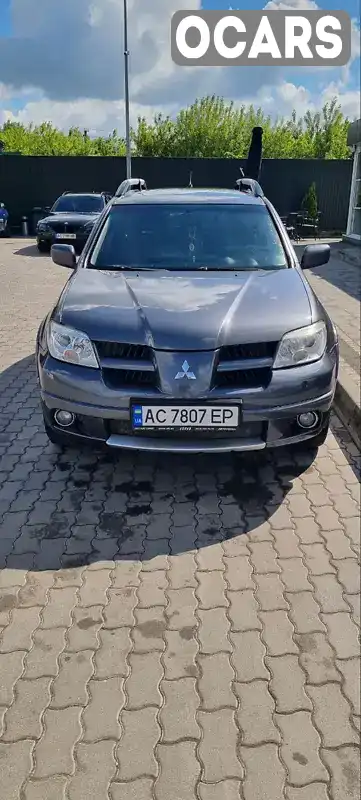 Внедорожник / Кроссовер Mitsubishi Outlander 2008 2 л. Ручная / Механика обл. Волынская, Владимир-Волынский - Фото 1/17