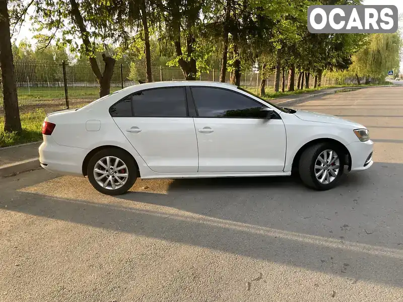 Седан Volkswagen Jetta 2015 1.8 л. Автомат обл. Житомирская, Звягель - Фото 1/21