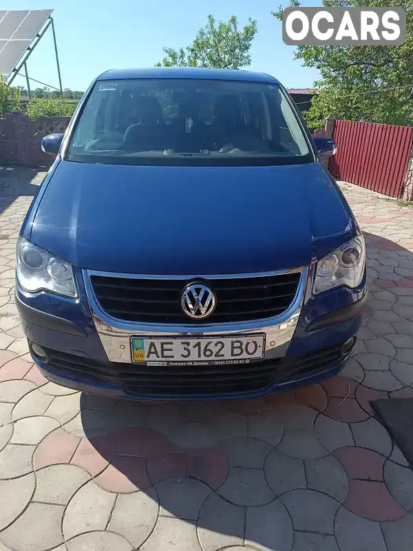 Мінівен Volkswagen Touran 2007 1.4 л. Ручна / Механіка обл. Дніпропетровська, location.city.kotivka - Фото 1/6