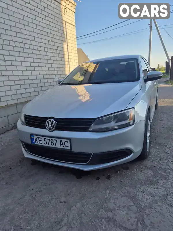 Седан Volkswagen Jetta 2014 1.8 л. Автомат обл. Дніпропетровська, Новомосковськ - Фото 1/12