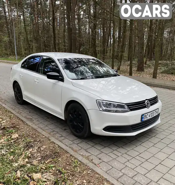 Седан Volkswagen Jetta 2013 2 л. Автомат обл. Львівська, Львів - Фото 1/21