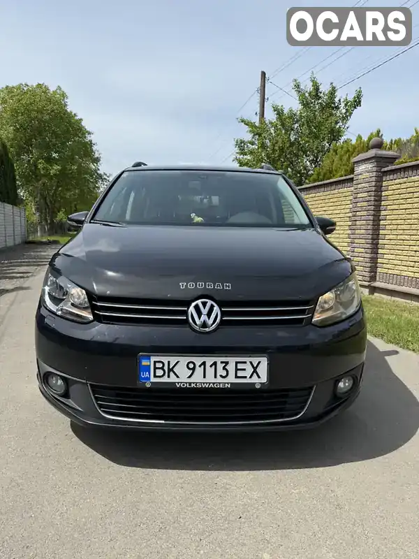 Минивэн Volkswagen Touran 2013 1.97 л. обл. Ровенская, Ровно - Фото 1/21