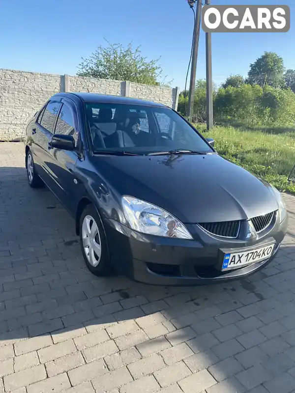 Седан Mitsubishi Lancer 2004 1.58 л. Ручная / Механика обл. Харьковская, Новая Водолага - Фото 1/7