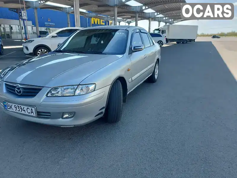 Седан Mazda 626 2001 2 л. Автомат обл. Ровенская, Ровно - Фото 1/15