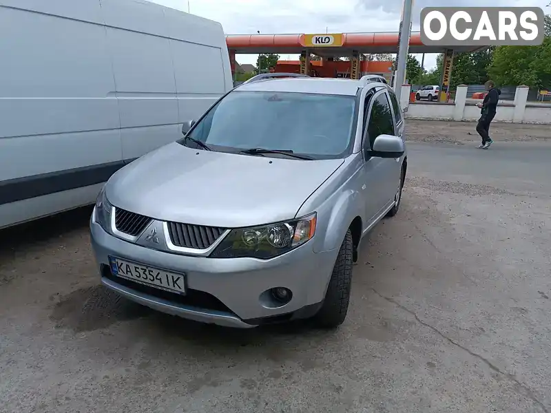 Позашляховик / Кросовер Mitsubishi Outlander XL 2009 2.4 л. Варіатор обл. Київська, Київ - Фото 1/21