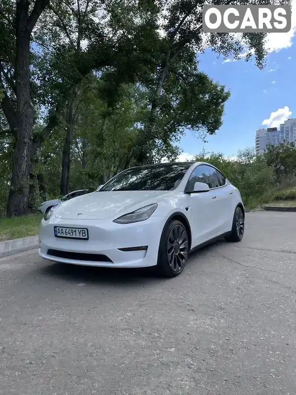 Внедорожник / Кроссовер Tesla Model Y 2021 null_content л. Автомат обл. Киевская, Киев - Фото 1/21