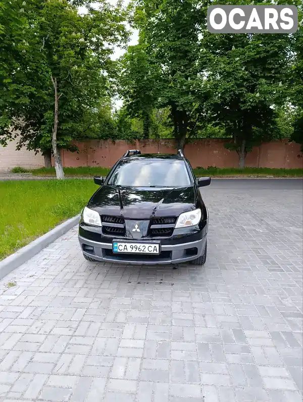 Позашляховик / Кросовер Mitsubishi Outlander 2005 2.4 л. Автомат обл. Черкаська, Черкаси - Фото 1/19