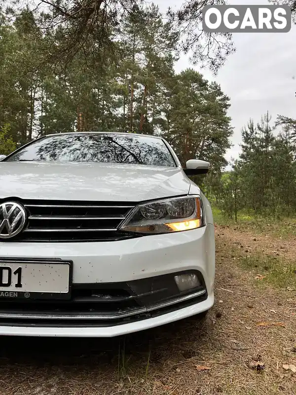 Седан Volkswagen Jetta 2014 1.8 л. Автомат обл. Чернігівська, Короп - Фото 1/13