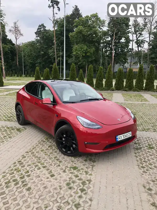 Внедорожник / Кроссовер Tesla Model Y 2023 null_content л. обл. Харьковская, Харьков - Фото 1/21