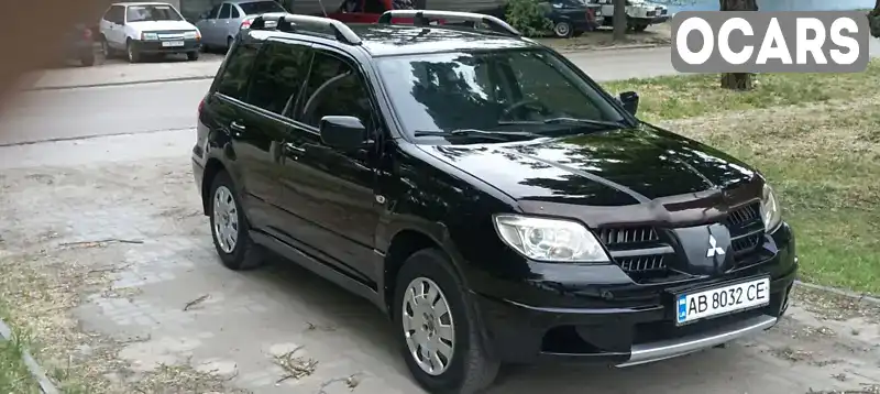 Внедорожник / Кроссовер Mitsubishi Outlander 2008 2 л. Ручная / Механика обл. Днепропетровская, Днепр (Днепропетровск) - Фото 1/19