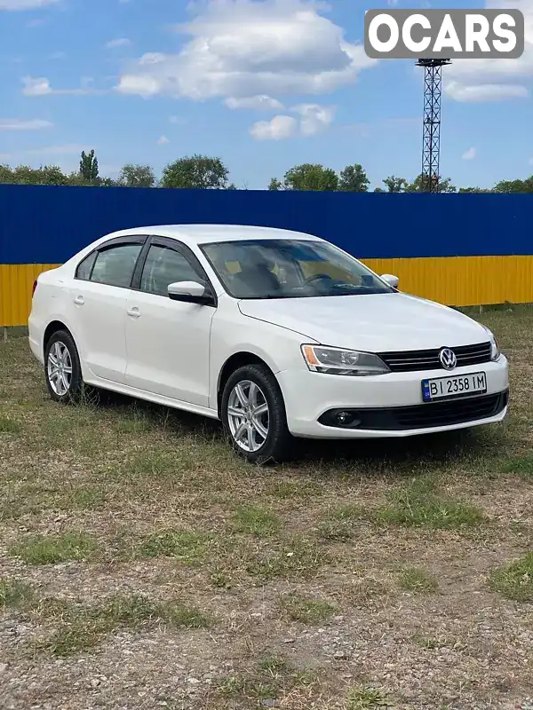 Седан Volkswagen Jetta 2012 2.48 л. Автомат обл. Полтавская, Кременчуг - Фото 1/19