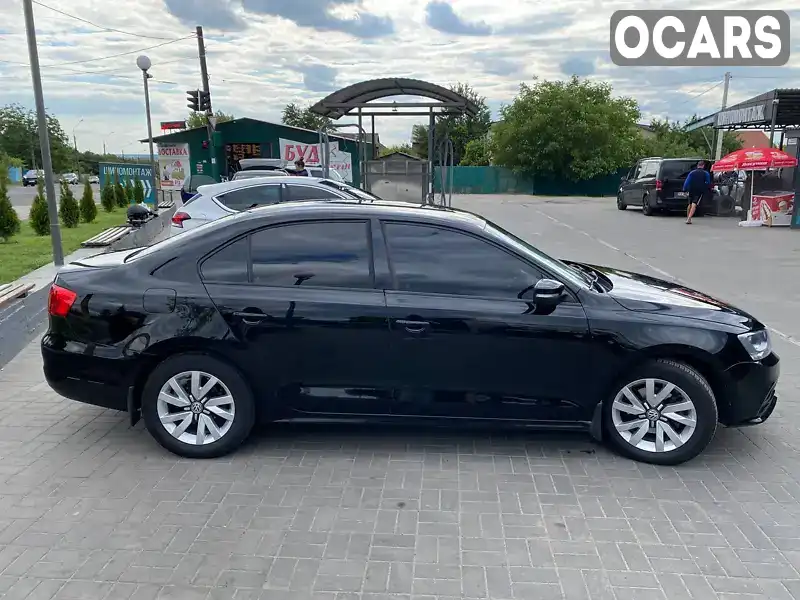 Седан Volkswagen Jetta 2012 2.48 л. Автомат обл. Запорізька, Запоріжжя - Фото 1/19