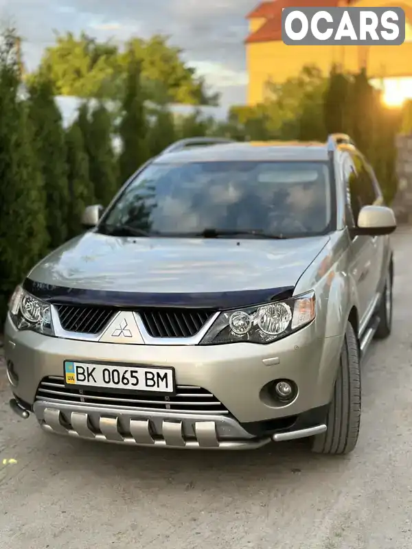 Внедорожник / Кроссовер Mitsubishi Outlander XL 2007 2.4 л. Вариатор обл. Ровенская, Млинов - Фото 1/21