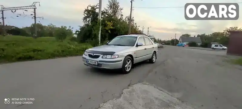 Седан Mazda 626 1998 2 л. Ручна / Механіка обл. Рівненська, Дубно - Фото 1/21