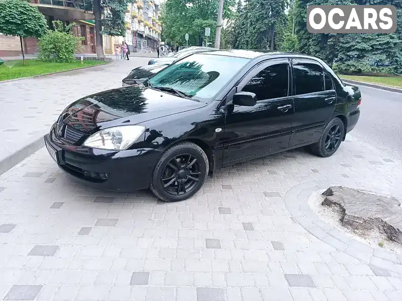 Седан Mitsubishi Lancer 2006 1.58 л. Ручна / Механіка обл. Дніпропетровська, Дніпро (Дніпропетровськ) - Фото 1/14