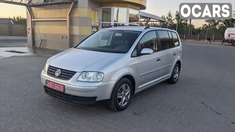 Мінівен Volkswagen Touran 2005 1.6 л. Ручна / Механіка обл. Рівненська, Дубно - Фото 1/21