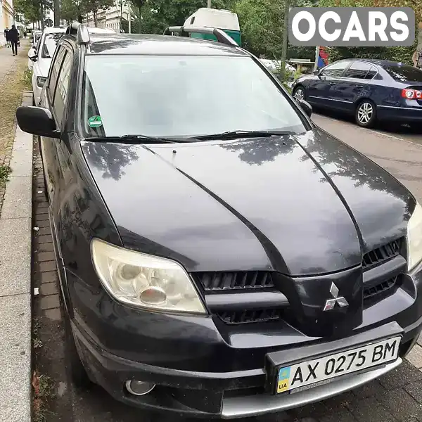 Внедорожник / Кроссовер Mitsubishi Outlander 2008 2.38 л. Автомат обл. Харьковская, Харьков - Фото 1/7