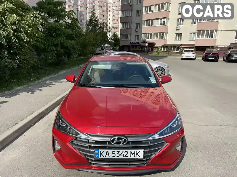 Седан Hyundai Elantra 2020 2 л. Автомат обл. Киевская, Вышневое - Фото 1/18