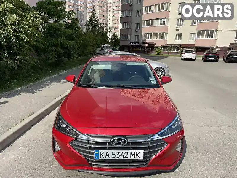 Седан Hyundai Elantra 2020 2 л. Автомат обл. Київська, Вишневе - Фото 1/18