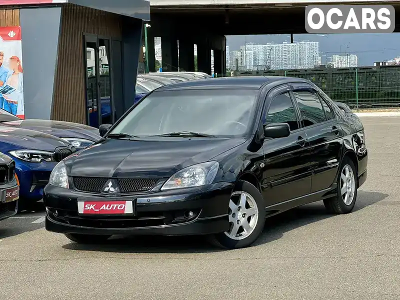 Седан Mitsubishi Lancer 2008 1.6 л. Автомат обл. Київська, Київ - Фото 1/21