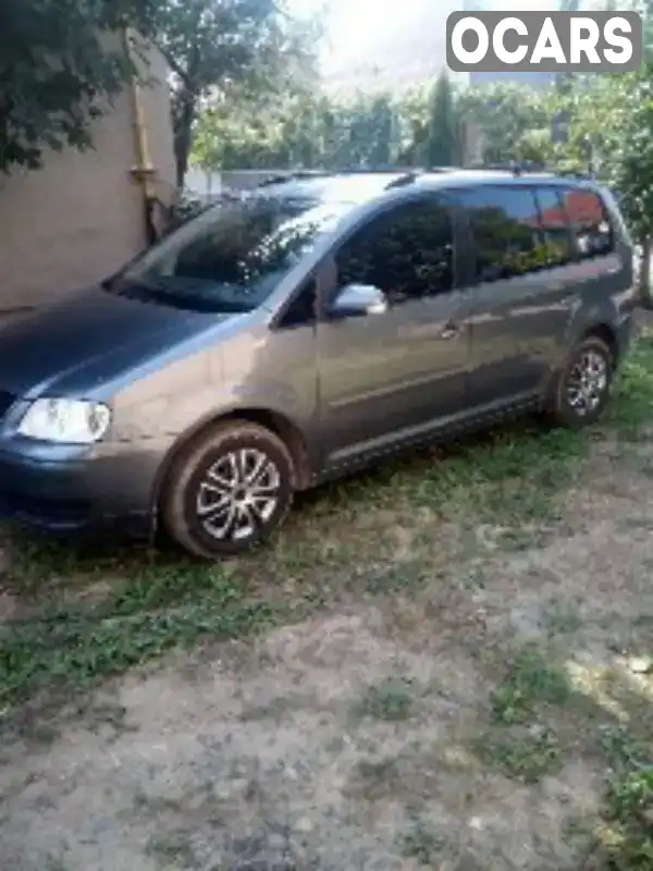 Мінівен Volkswagen Touran 2004 1.98 л. Ручна / Механіка обл. Закарпатська, Ужгород - Фото 1/5