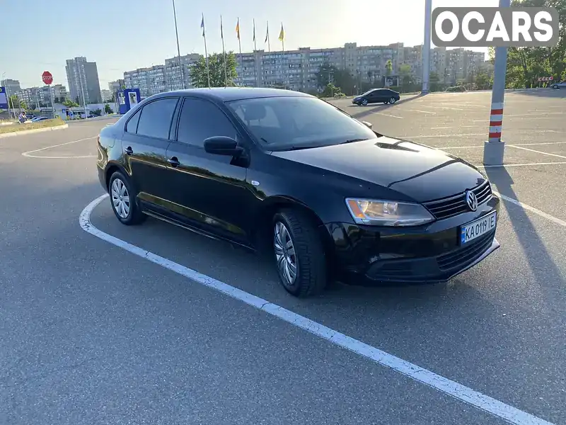 Седан Volkswagen Jetta 2014 2 л. Автомат обл. Киевская, Киев - Фото 1/21