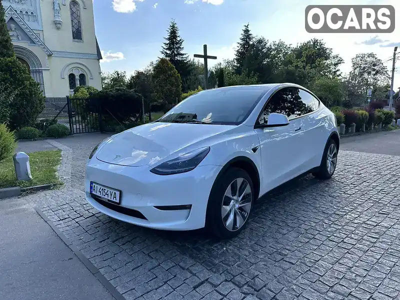 Позашляховик / Кросовер Tesla Model Y 2023 null_content л. Автомат обл. Київська, Київ - Фото 1/21