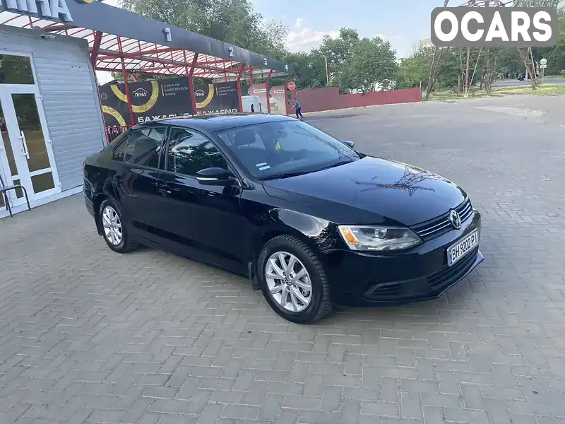 Седан Volkswagen Jetta 2012 2.48 л. Автомат обл. Миколаївська, Миколаїв - Фото 1/21