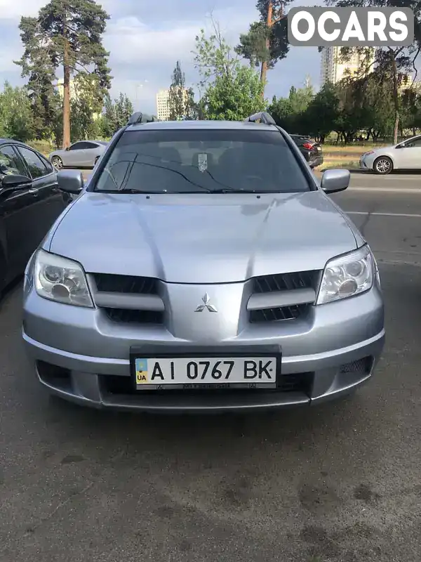 Позашляховик / Кросовер Mitsubishi Outlander 2008 2.38 л. Автомат обл. Київська, Київ - Фото 1/21