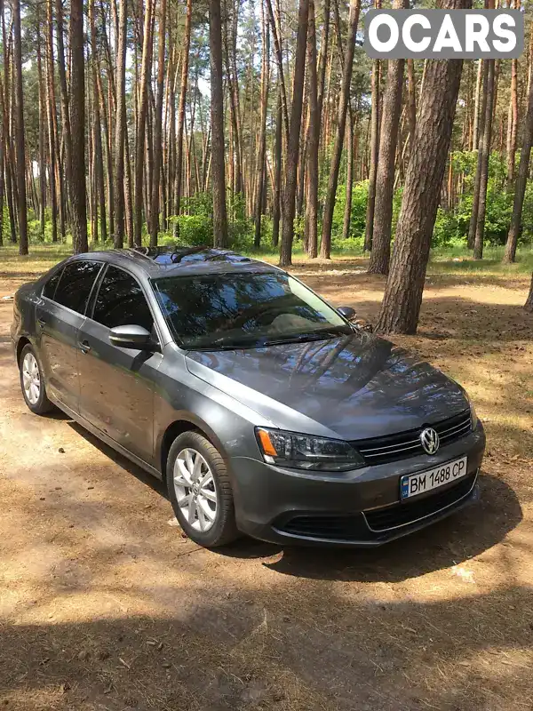 Седан Volkswagen Jetta 2013 2.48 л. Автомат обл. Сумська, Охтирка - Фото 1/14