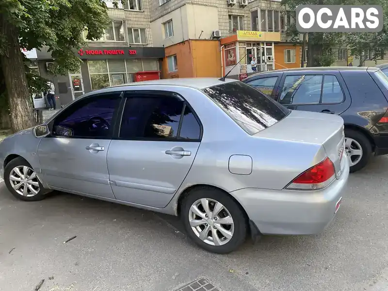 Седан Mitsubishi Lancer 2007 1.6 л. Автомат обл. Київська, Київ - Фото 1/19