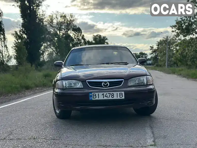 Седан Mazda 626 2000 2 л. Автомат обл. Полтавська, Кременчук - Фото 1/9