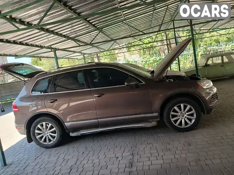 Внедорожник / Кроссовер Volkswagen Touareg 2011 3.6 л. обл. Херсонская, Херсон - Фото 1/11