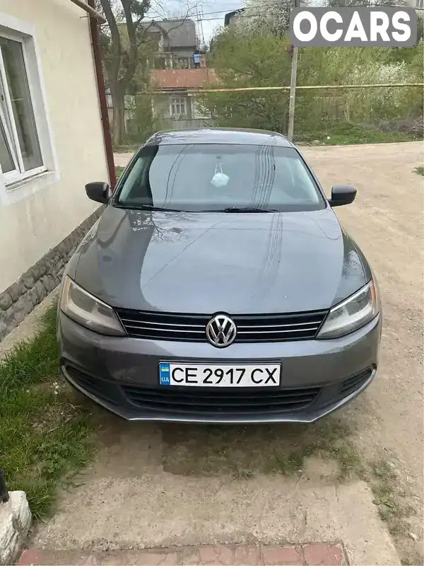 Седан Volkswagen Jetta 2013 2 л. Ручная / Механика обл. Черновицкая, Черновцы - Фото 1/14