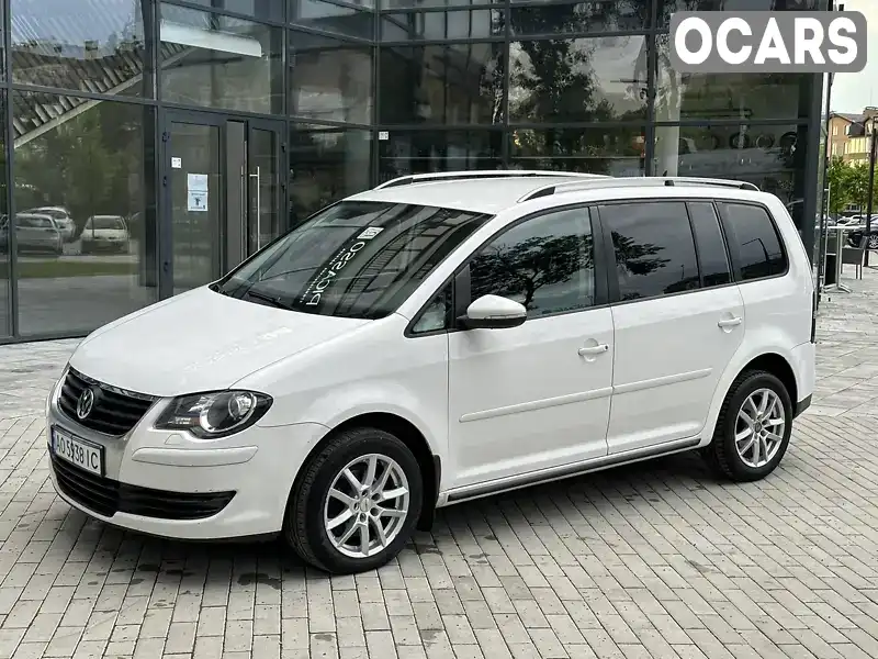 Минивэн Volkswagen Touran 2010 1.39 л. Ручная / Механика обл. Закарпатская, Ужгород - Фото 1/21