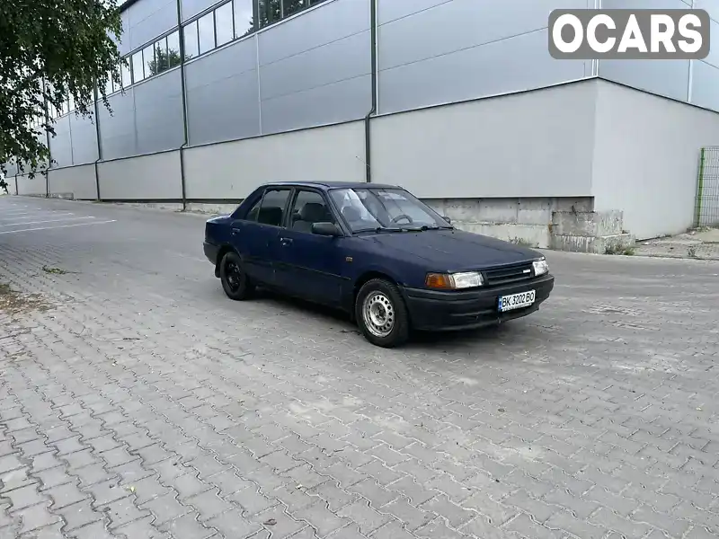 Седан Mazda 323 1990 1.5 л. Ручна / Механіка обл. Рівненська, Рівне - Фото 1/16