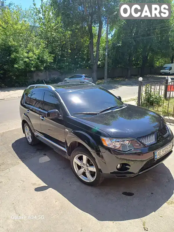 Внедорожник / Кроссовер Mitsubishi Outlander 2009 3 л. Автомат обл. Днепропетровская, Днепр (Днепропетровск) - Фото 1/9