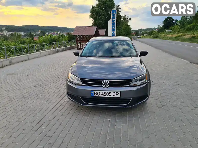 Седан Volkswagen Jetta 2014 2 л. Автомат обл. Тернопольская, Тернополь - Фото 1/17