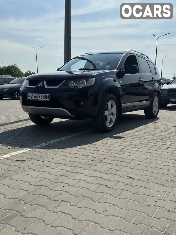 Позашляховик / Кросовер Mitsubishi Outlander 2008 2.4 л. Ручна / Механіка обл. Київська, Київ - Фото 1/21