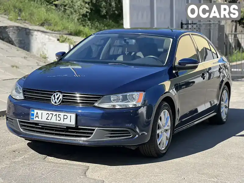 Седан Volkswagen Jetta 2013 1.8 л. Автомат обл. Київська, Київ - Фото 1/21