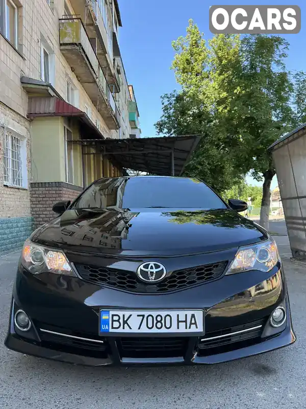 Седан Toyota Camry 2014 2.49 л. Автомат обл. Рівненська, Рівне - Фото 1/21