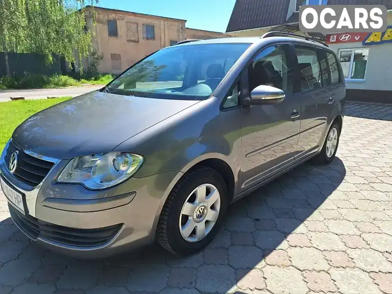 Минивэн Volkswagen Touran 2010 1.4 л. Ручная / Механика обл. Житомирская, Коростень - Фото 1/21