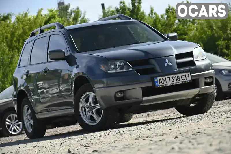 Внедорожник / Кроссовер Mitsubishi Outlander 2004 2 л. Ручная / Механика обл. Житомирская, Бердичев - Фото 1/21