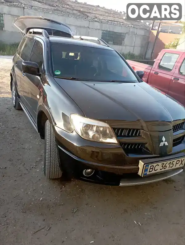 Позашляховик / Кросовер Mitsubishi Outlander 2007 2.4 л. Автомат обл. Львівська, Городок - Фото 1/17