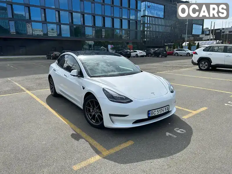Седан Tesla Model 3 2023 null_content л. обл. Киевская, Киев - Фото 1/21
