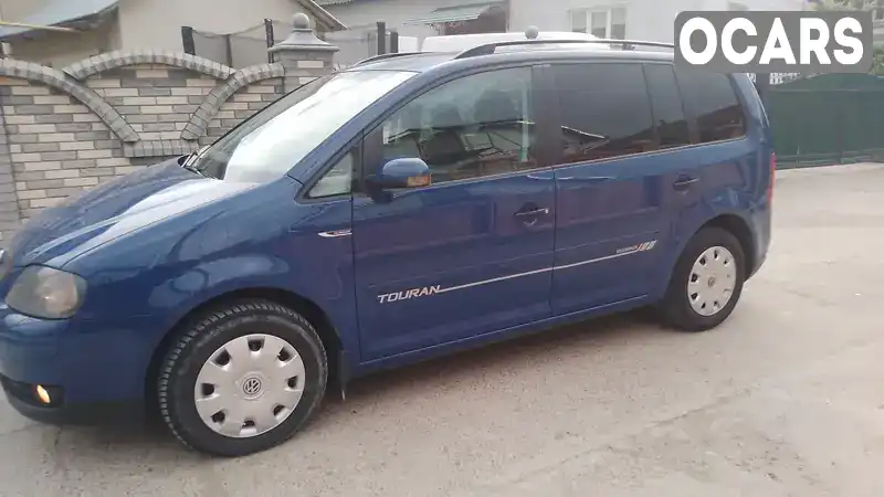 Минивэн Volkswagen Touran 2006 1.9 л. Ручная / Механика обл. Хмельницкая, Волочиск - Фото 1/21