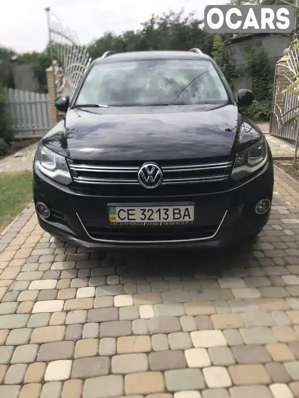 Внедорожник / Кроссовер Volkswagen Tiguan 2013 1.97 л. Автомат обл. Черновицкая, Кельменцы - Фото 1/7