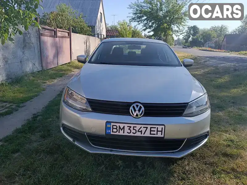 Седан Volkswagen Jetta 2014 2 л. Ручна / Механіка обл. Сумська, Охтирка - Фото 1/8