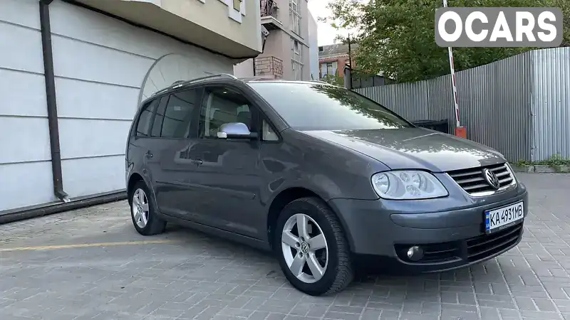 Мінівен Volkswagen Touran 2005 2 л. Автомат обл. Київська, Київ - Фото 1/15